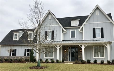 black metal roof on gray house|gray homes with black roofs.